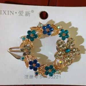 A decorative floral hair clip