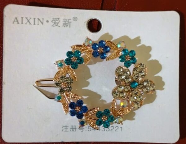 A decorative floral hair clip